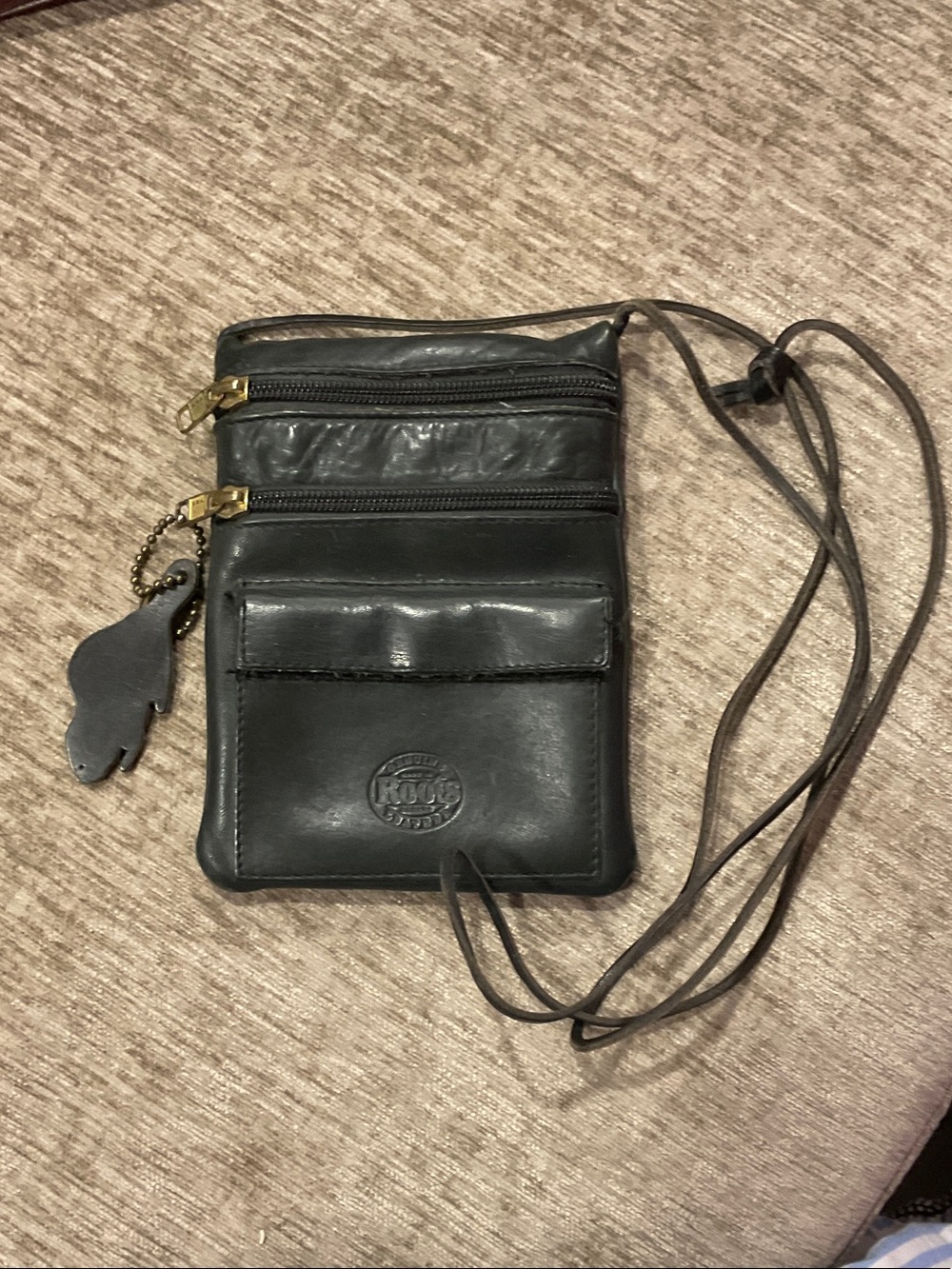 Vintage Roots Black Leather mini cross body pouch or passport bag